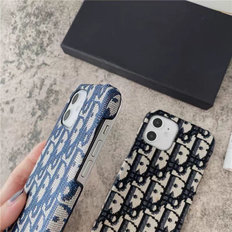 Casing iPhone berbahan kain bordir merek fashion
