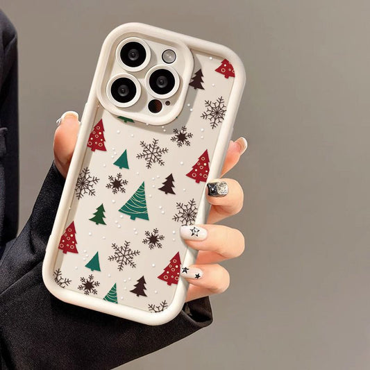 Casing ponsel Apple dengan motif pohon Natal dan kepingan salju