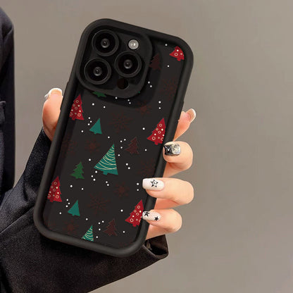 Casing ponsel Apple dengan motif pohon Natal dan kepingan salju