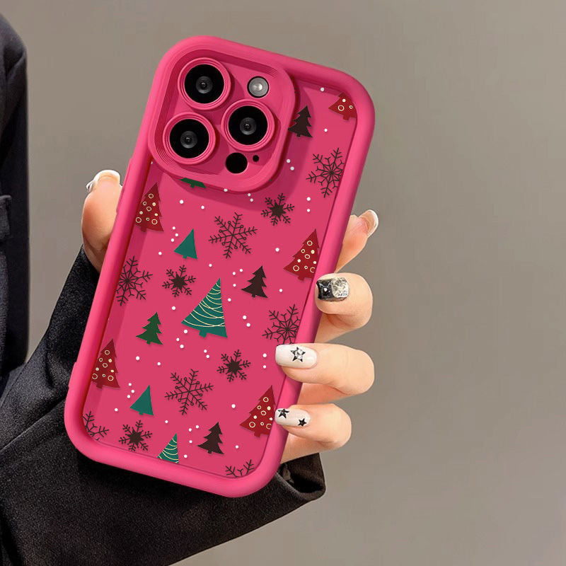 Casing ponsel Apple dengan motif pohon Natal dan kepingan salju